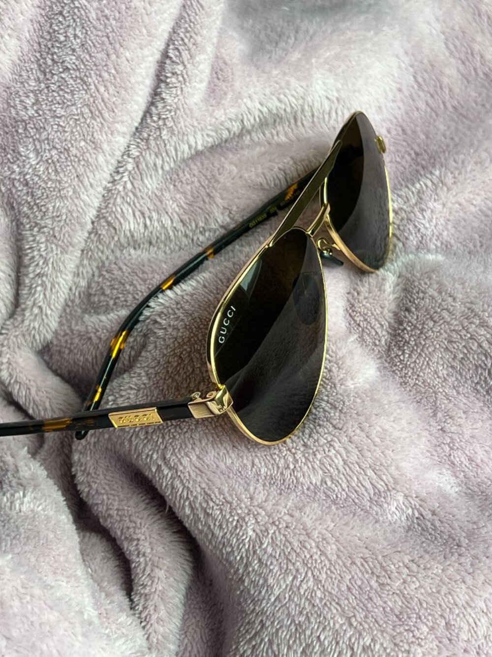 Authentic Gucci GG1163S aviator sunglasses in gold with grey lenses.